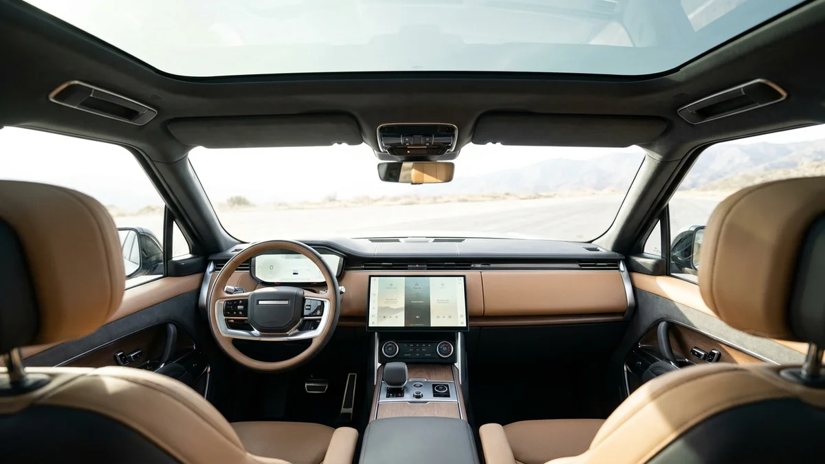 Interior cabin and dashboard of a modern three-row electric SUV